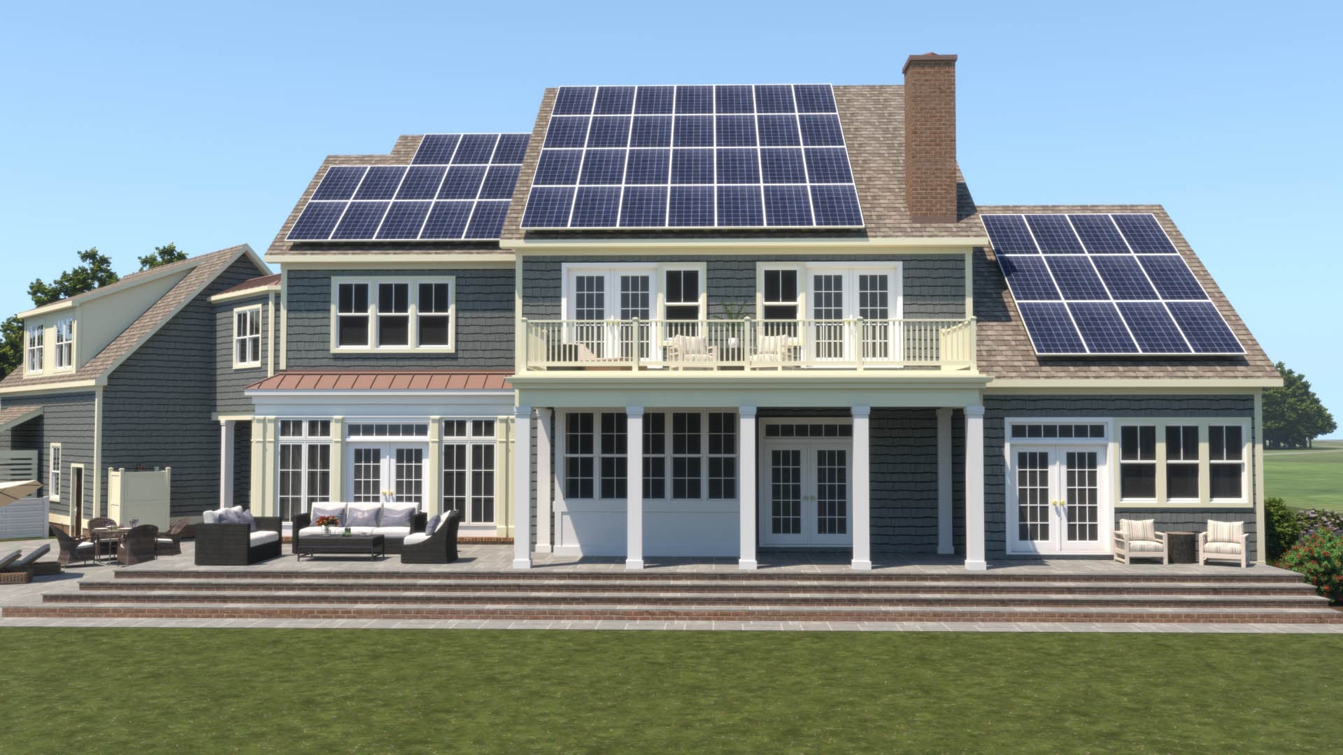 3D architectural rendering of the rear elevation of a shingle-style two-story residence featuring solar panels on the roof, a second-floor balcony with white railing, and a raised stone patio